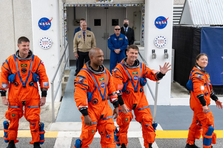 (From left to right) Canadian Space Agency (CSA) astronaut Jeremy Hansen as well as NASA astronauts and Artemis II mission specialist Victor Glover, Artemis II commander and pilot Reid Wiseman, Artemis II mission specialist Christina Koch walk out before traveling to the launch pad to board the Space Launch System (SLS) rocket for the Artemis II crewed lunar mission at Kennedy Space Center in Cape Canaveral, Florida, the United States on April 1, 2026. The NASA mission dubbed Artemis 2 has been years in the making after facing repeated setbacks, but is finally scheduled to take off from Florida as early as April 1 at 6:24 p.m.